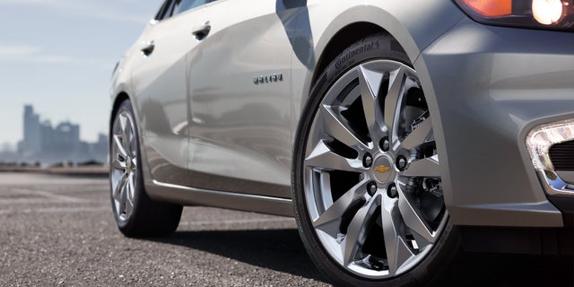 Close-up view of front wheel of a Chevy Malibu