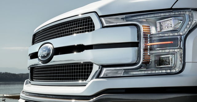 Close up view of a grille of a Ford Truck
