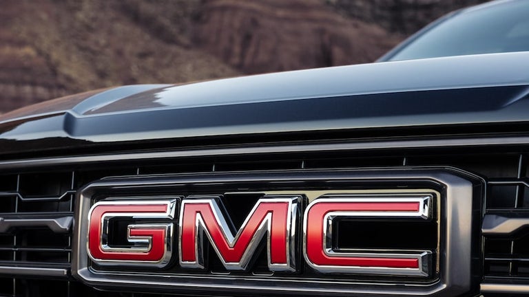 Close-up of the Front GMC Badging on the Grille of the 2025 Yukon Large SUV